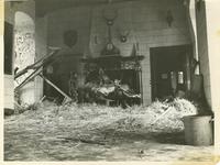 GI soldier looks at relics of Merode Castle in Langerwehe, Germany.